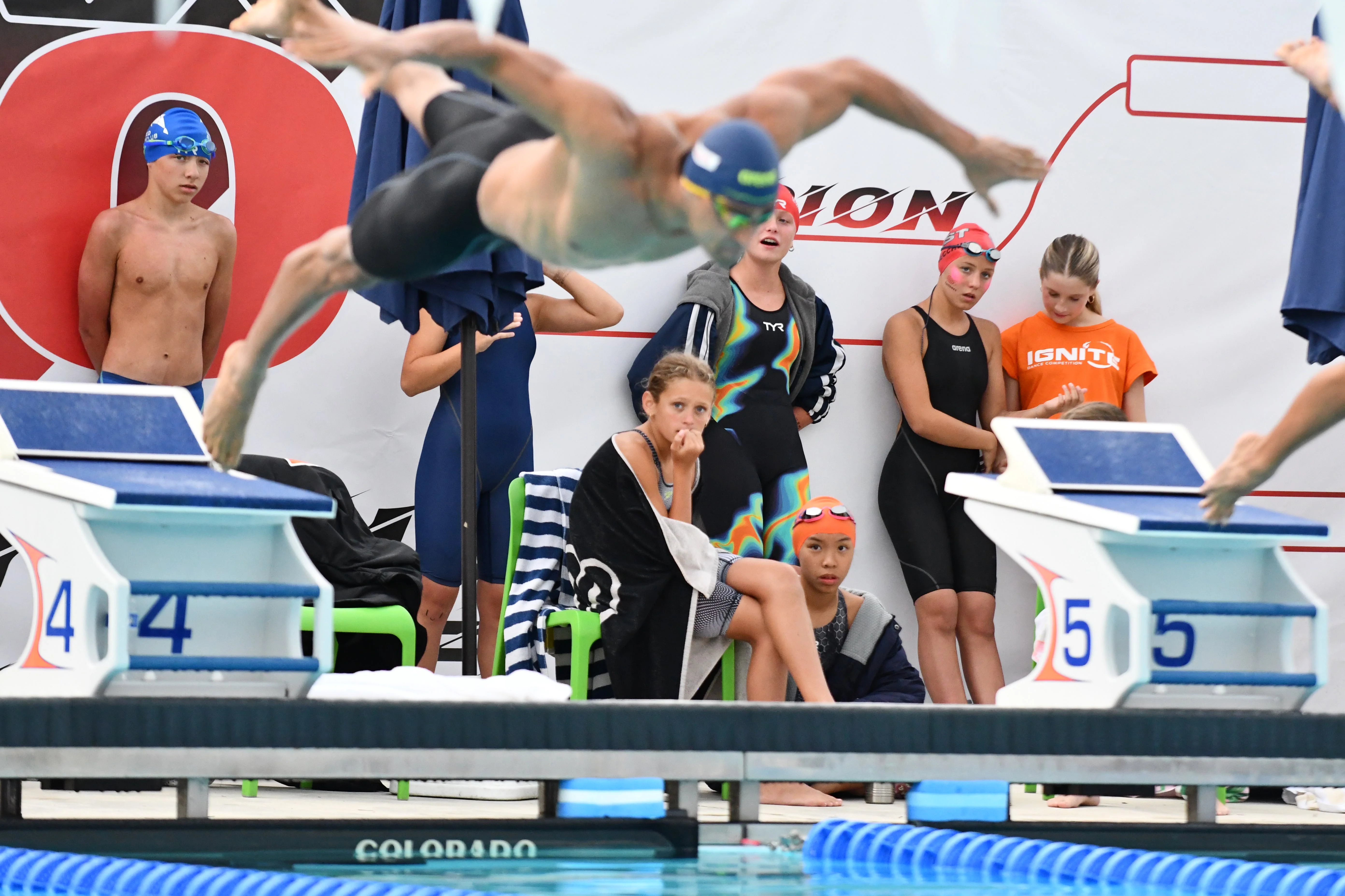 Swimmer leaving the blocks during a start